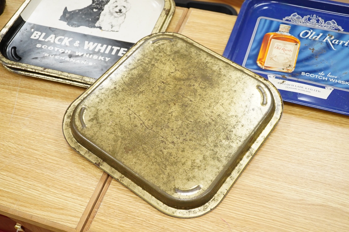 Five 1960s pub advertising trays for Scotch Whisky to include Johnnie Walker and Black & White, Buchanans, 35cm wide